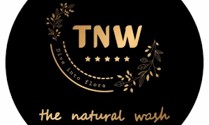 Logo of The Natural Wash, featuring a clean and modern design that emphasizes eco-friendly products.